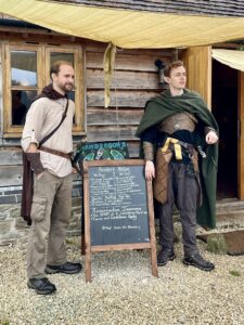 Summer Star Men in Costume by the tavern